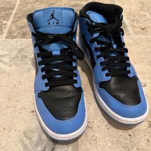 Nike Air Jordans. Blue, Black. Worn only once.